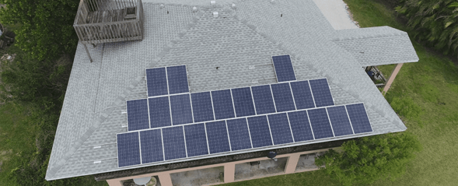 Aerial view of a Sarasota home with rooftop solar panels installed by Mirasol Solar, highlighting summer tips to stay cool and save on energy.