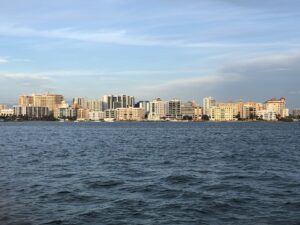 Sarasota Florida skyline view from the water with downtown buildings at sunset
