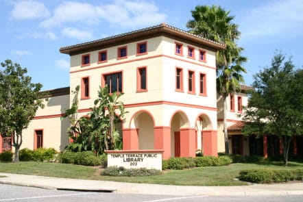 Charlotte County Courthouse in Punta Gorda, Florida, featuring historic architecture with columns and an American flag in front