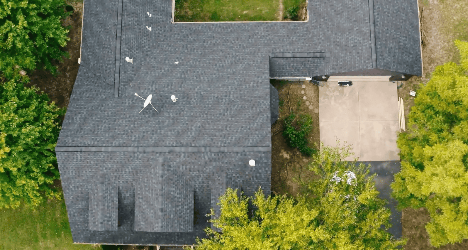 Completed residential architectural shingle roof on a Florida home